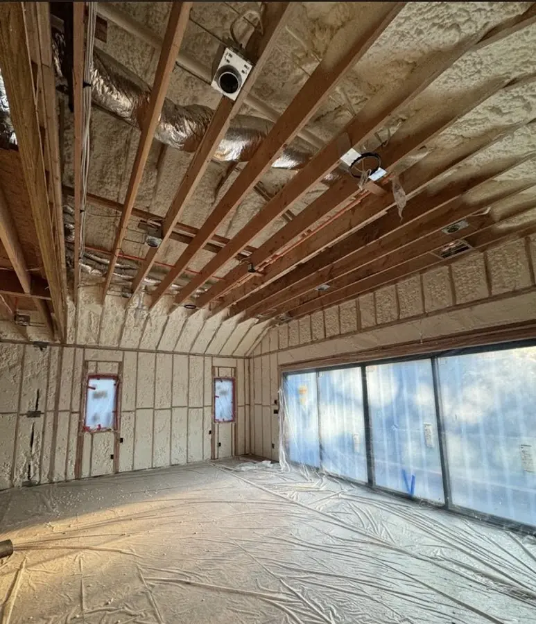 Interior walls and ceiling insulated with spray foam during new construction in Lake Magdalene